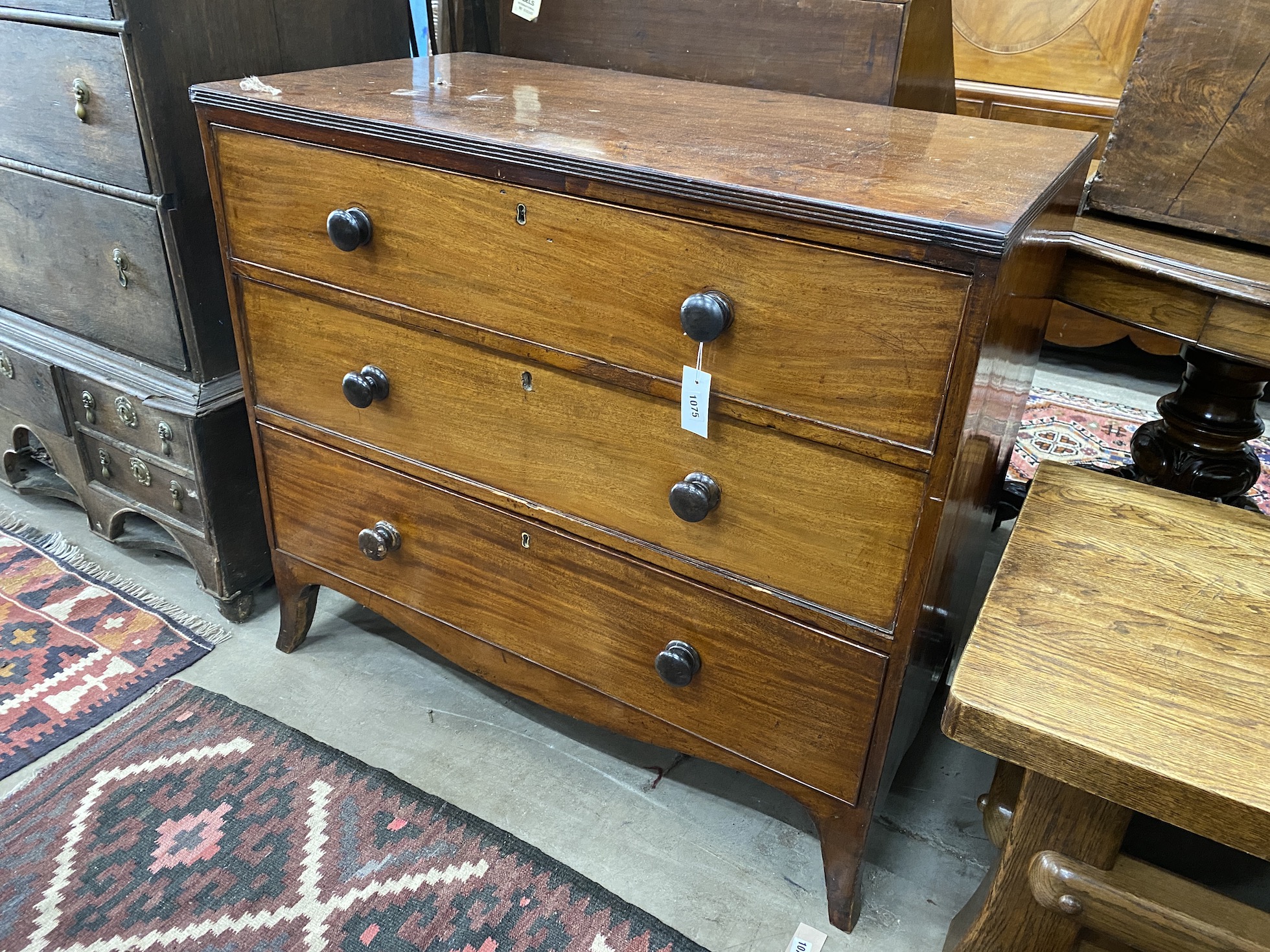 A Regency mahogany chest of three drawers, raised on bracket supports, width 96cm, depth 53cm, height 87cm